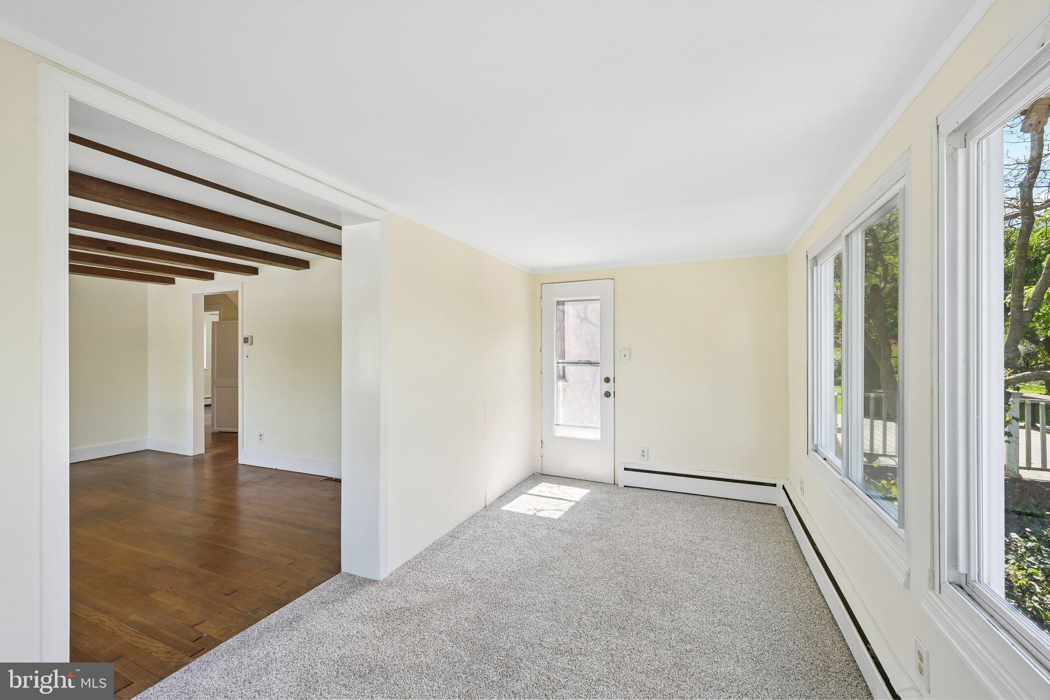 605 Venture Road Hockessin, DE 19707 - Photo 26 of 66 Den with door to backyard