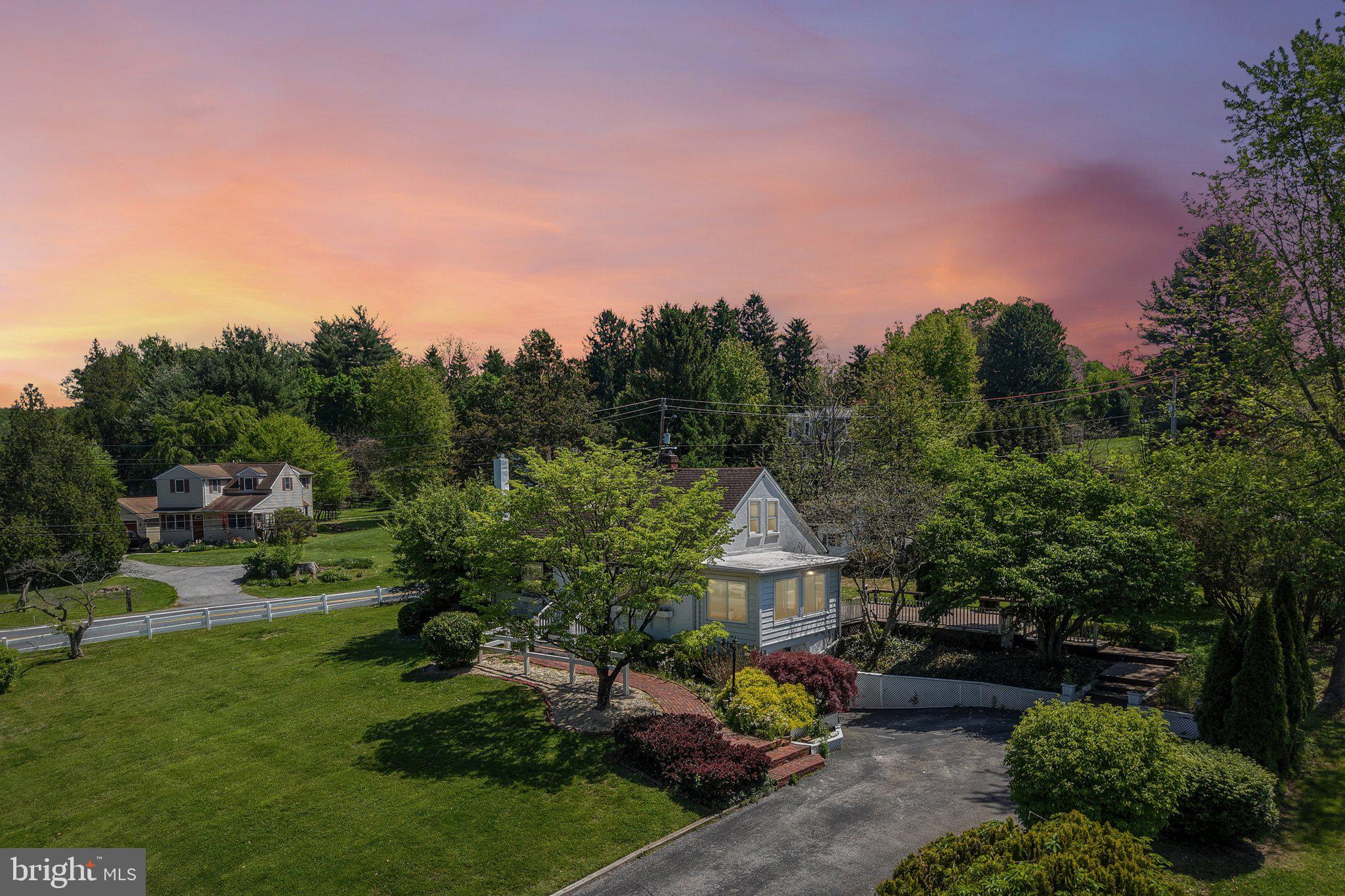 605 Venture Road Hockessin, DE 19707 - Photo 62 of 66 Drone front exterior-dusk