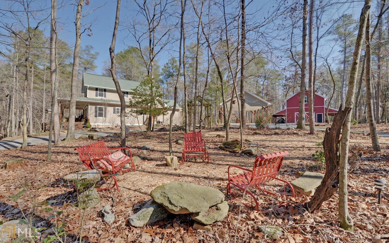 1120 Holt Road, Unit 55 Ellijay, GA 30536 - Photo 1 of 1 a view of a lake with a house