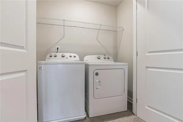 a utility room with dryer and washer