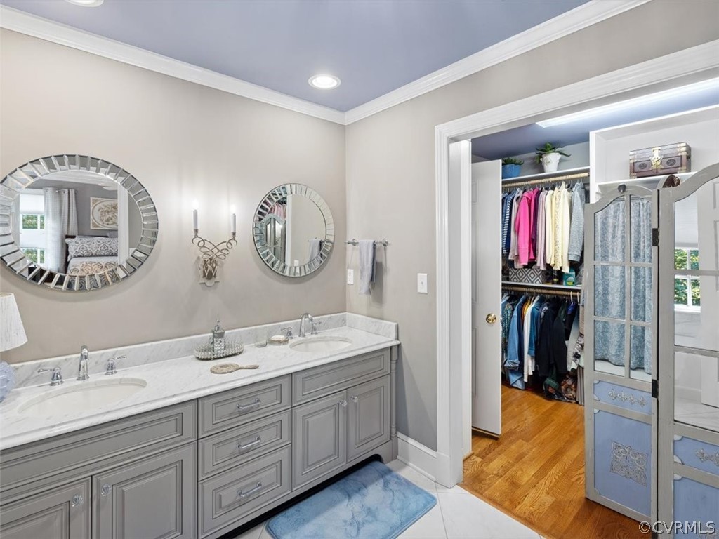 2310 Dorking Road North Chesterfield, VA 23236 - Photo 18 of 44 a en suite bathroom with a double vanity sink and a mirror