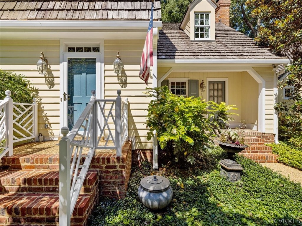 2310 Dorking Road North Chesterfield, VA 23236 - Photo 2 of 44 a front view of a house with a yard and potted plants