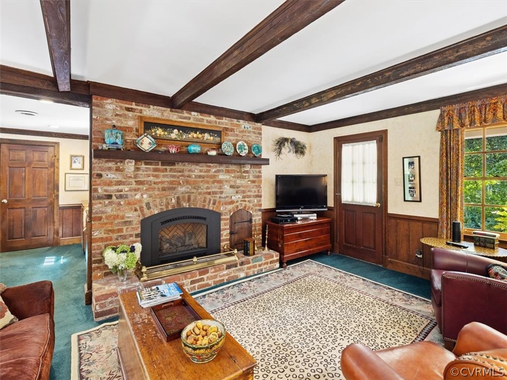 2310 Dorking Road North Chesterfield, VA 23236 - Photo 21 of 44 a living room with furniture a flat screen tv and a fireplace