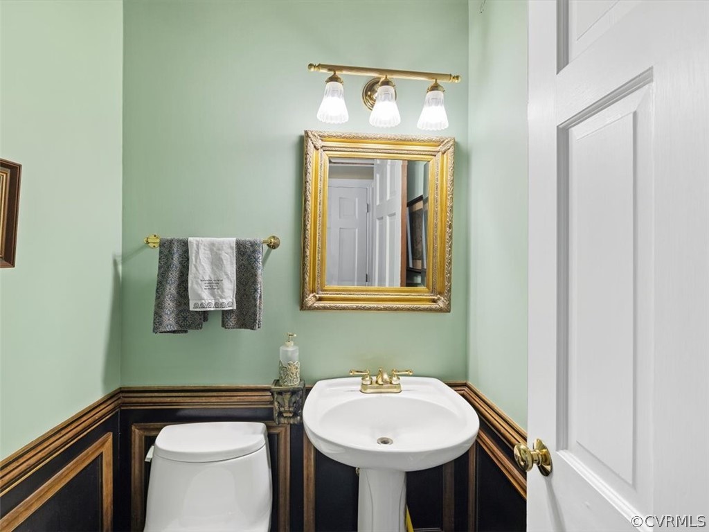 2310 Dorking Road North Chesterfield, VA 23236 - Photo 26 of 44 a bathroom with a sink and a mirror