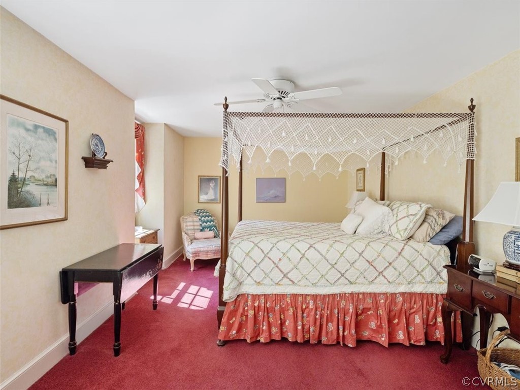 2310 Dorking Road North Chesterfield, VA 23236 - Photo 30 of 44 a bedroom with a bed and a table in it