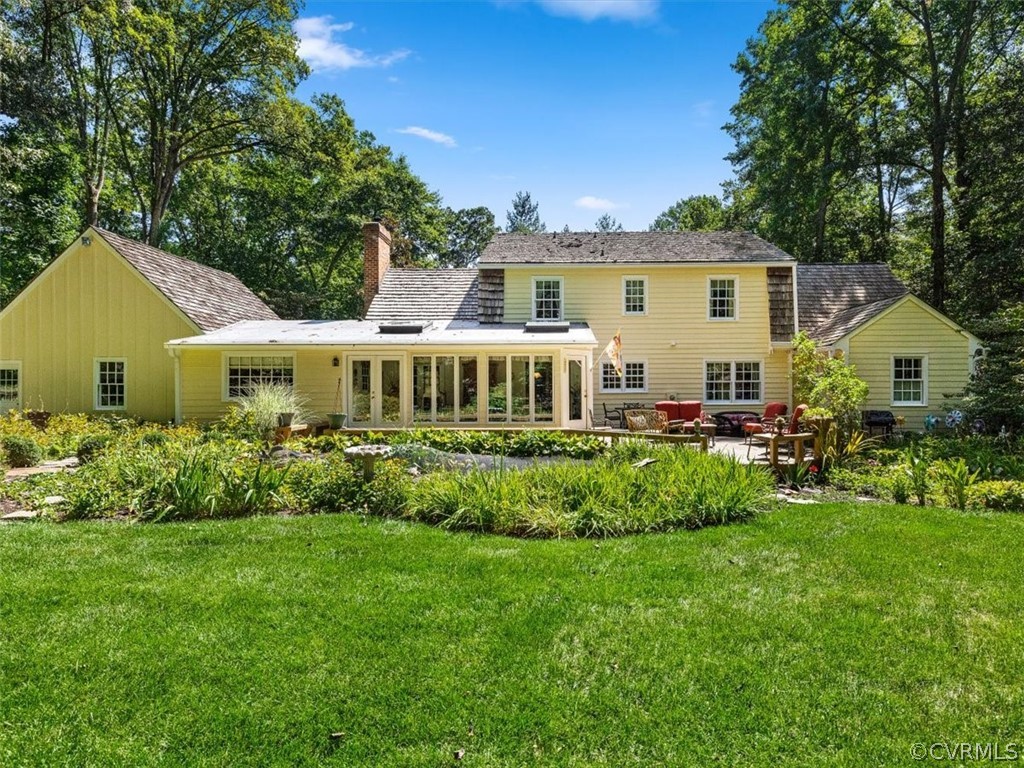 2310 Dorking Road North Chesterfield, VA 23236 - Photo 40 of 44 a front view of a house with a garden