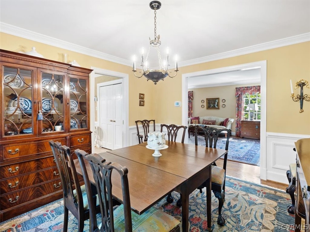 2310 Dorking Road North Chesterfield, VA 23236 - Photo 8 of 44 a view of a dining room with furniture and wooden floor