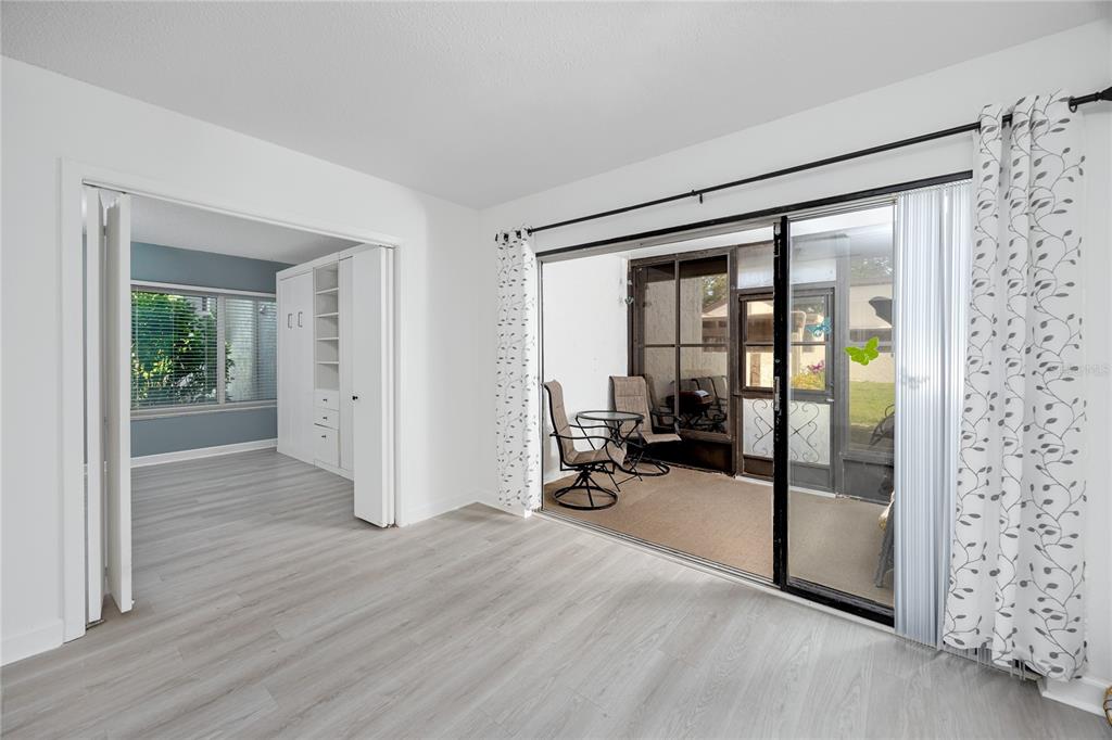 2207 Belleair Road, Unit B4 Clearwater, FL 33764 - Photo 10 of 37 a view of a room with wooden floor and furniture