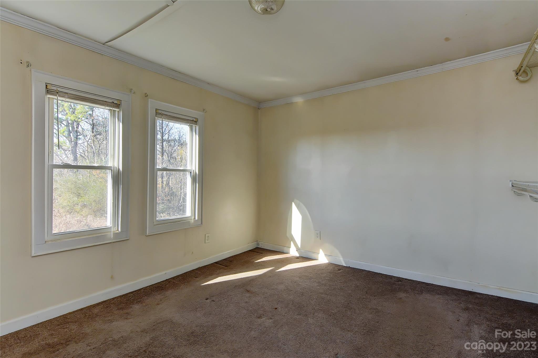 6202 White Store Pageland Road Marshville, NC 28103 - Photo 19 of 22 an empty room with windows