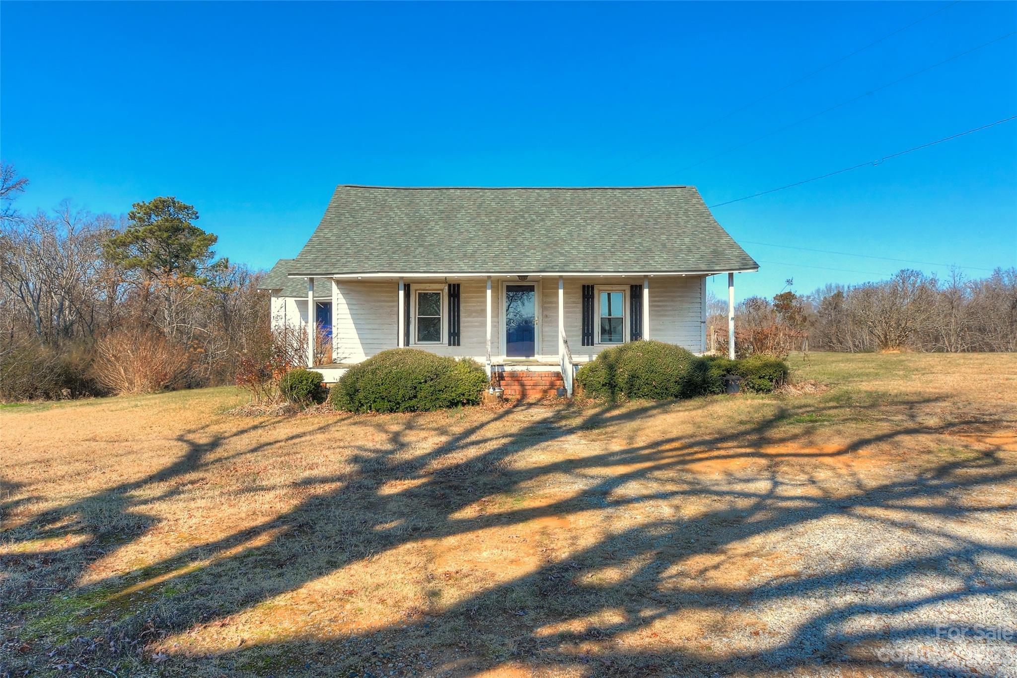 6202 White Store Pageland Road Marshville, NC 28103 - Photo 2 of 22 a house view with a backyard space