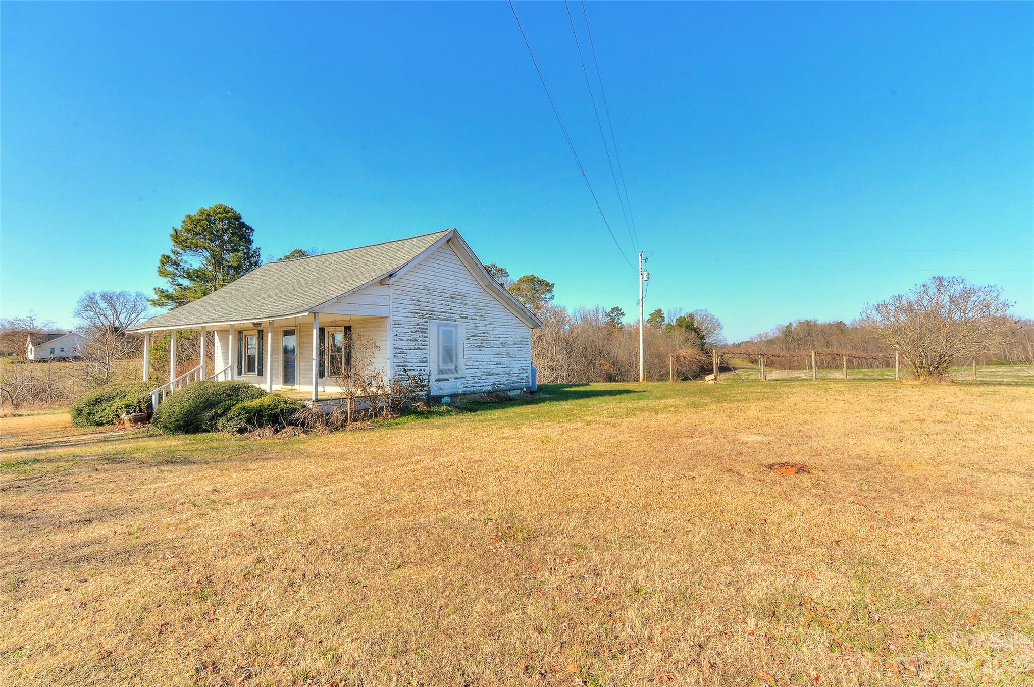 6202 White Store Pageland Road Marshville, NC 28103 - Photo 5 of 22 a front view of a house with a yard