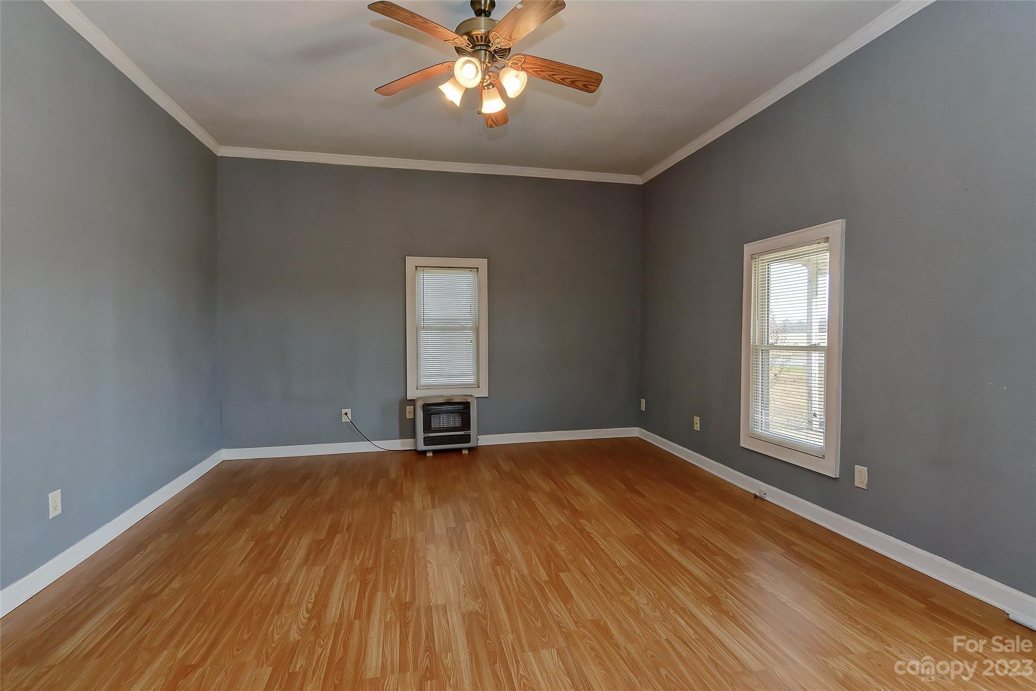 6202 White Store Pageland Road Marshville, NC 28103 - Photo 9 of 22 wooden floor in an empty room with a window