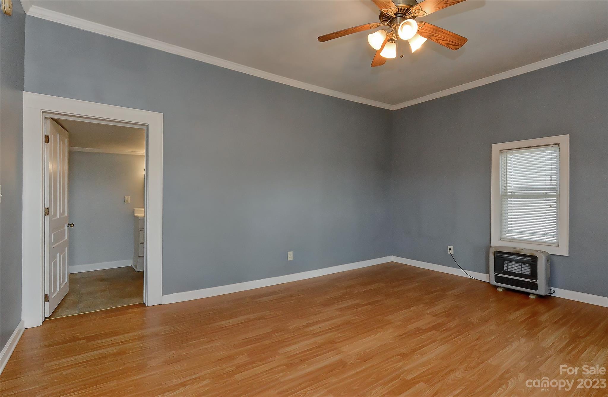 6202 White Store Pageland Road Marshville, NC 28103 - Photo 10 of 22 a view of a room with a chandelier fan and a window