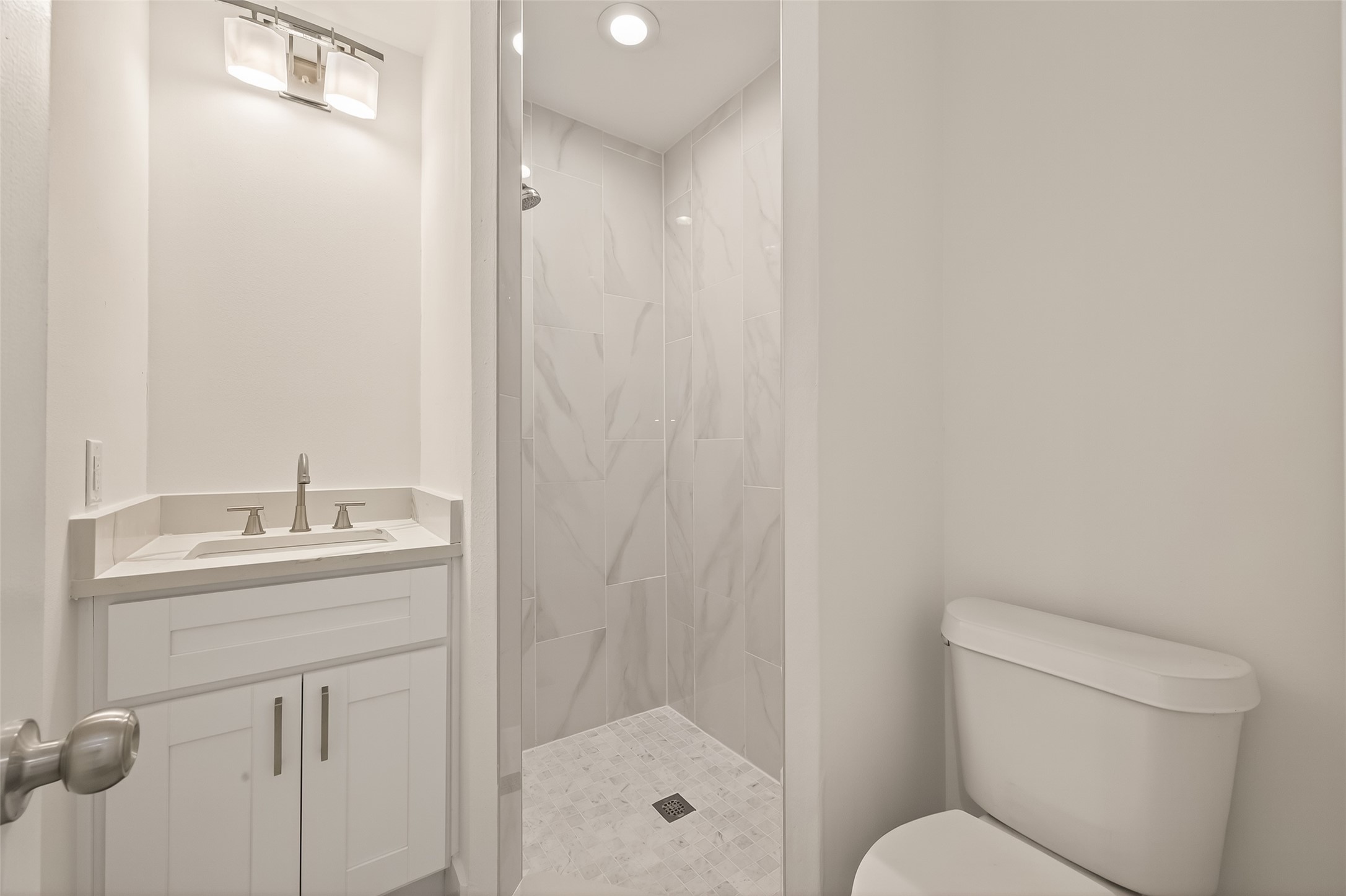 2723 Castledale Drive Houston, TX 77093 - Photo 20 of 38 a bathroom with a granite countertop sink toilet and shower