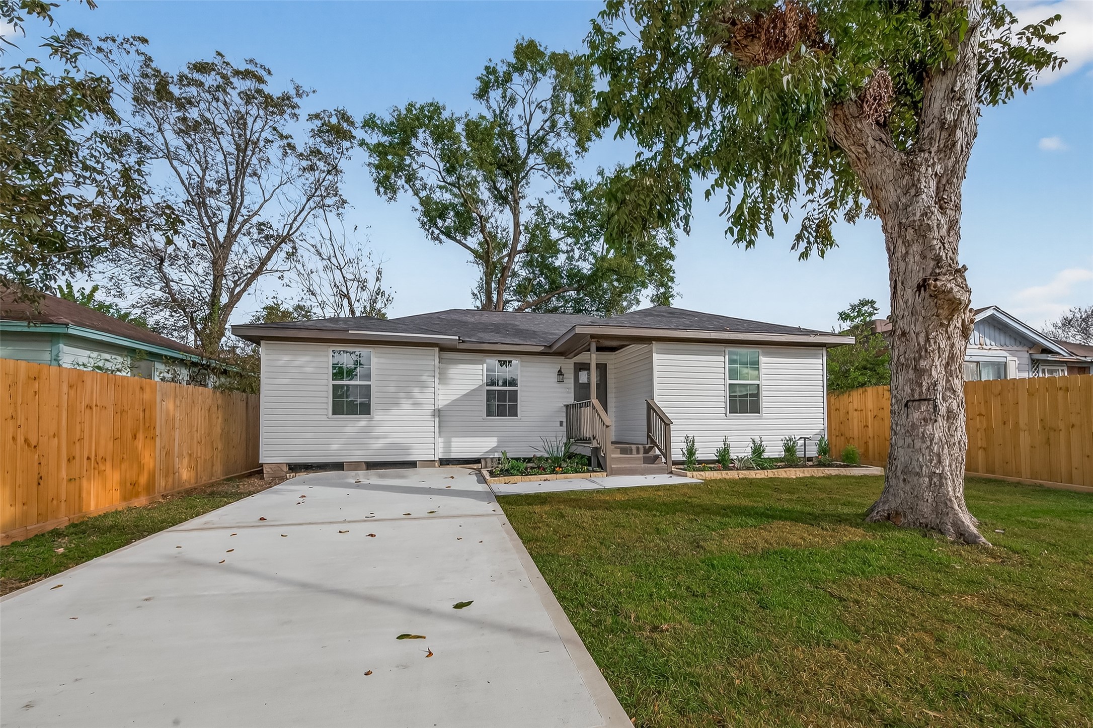 2723 Castledale Drive Houston, TX 77093 - Photo 3 of 38 a front view of house with yard and trees