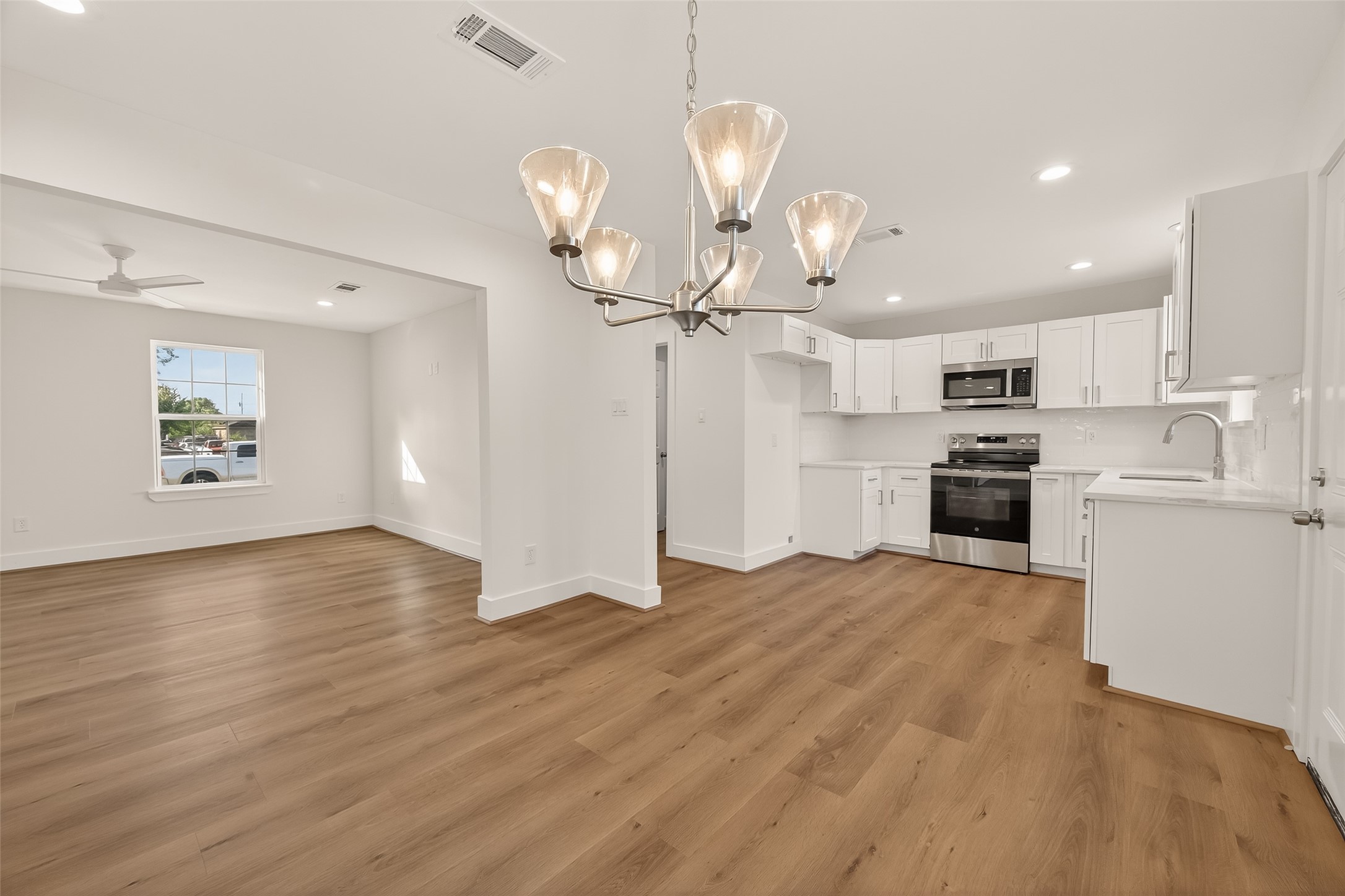 2723 Castledale Drive Houston, TX 77093 - Photo 10 of 38 a view of kitchen with sink microwave and stove