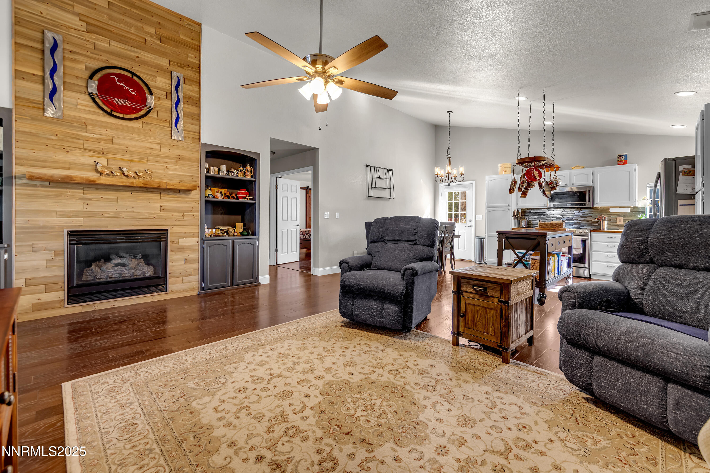 1077 Deena Way Fallon, NV 89406 - Photo 11 of 38 a living room with furniture and a fireplace