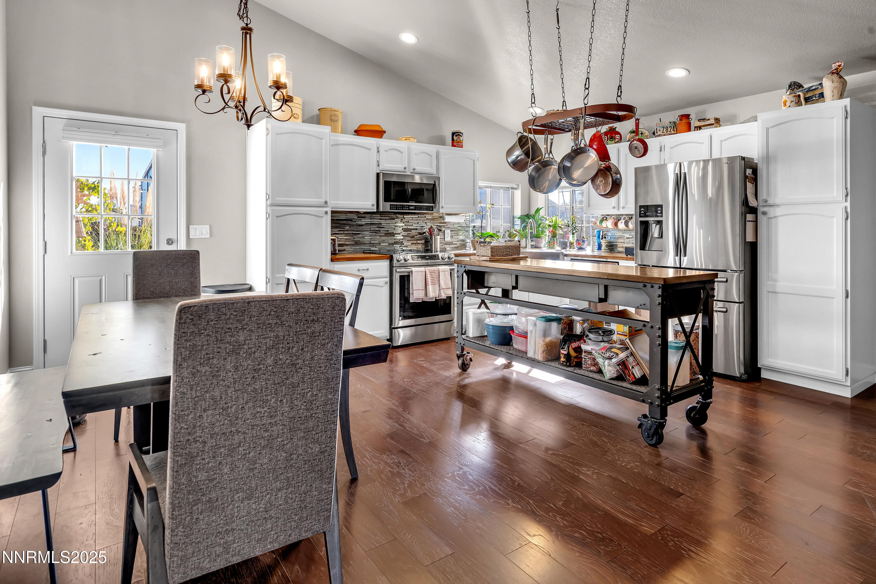 1077 Deena Way Fallon, NV 89406 - Photo 15 of 38 a view of kitchen with stainless steel appliances granite countertop refrigerator microwave and stove top oven
