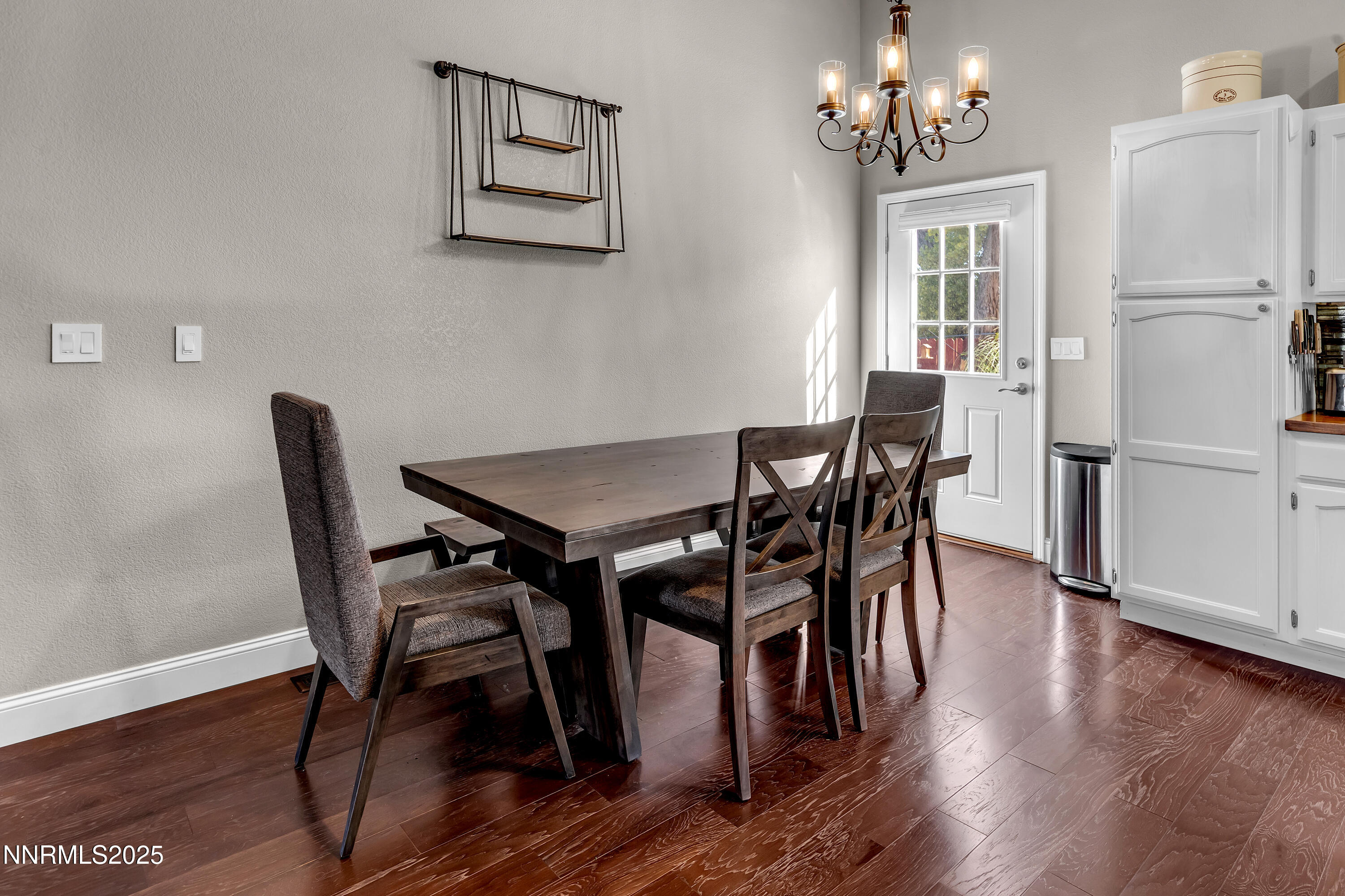 1077 Deena Way Fallon, NV 89406 - Photo 18 of 38 a view of a dining room with furniture and wooden floor