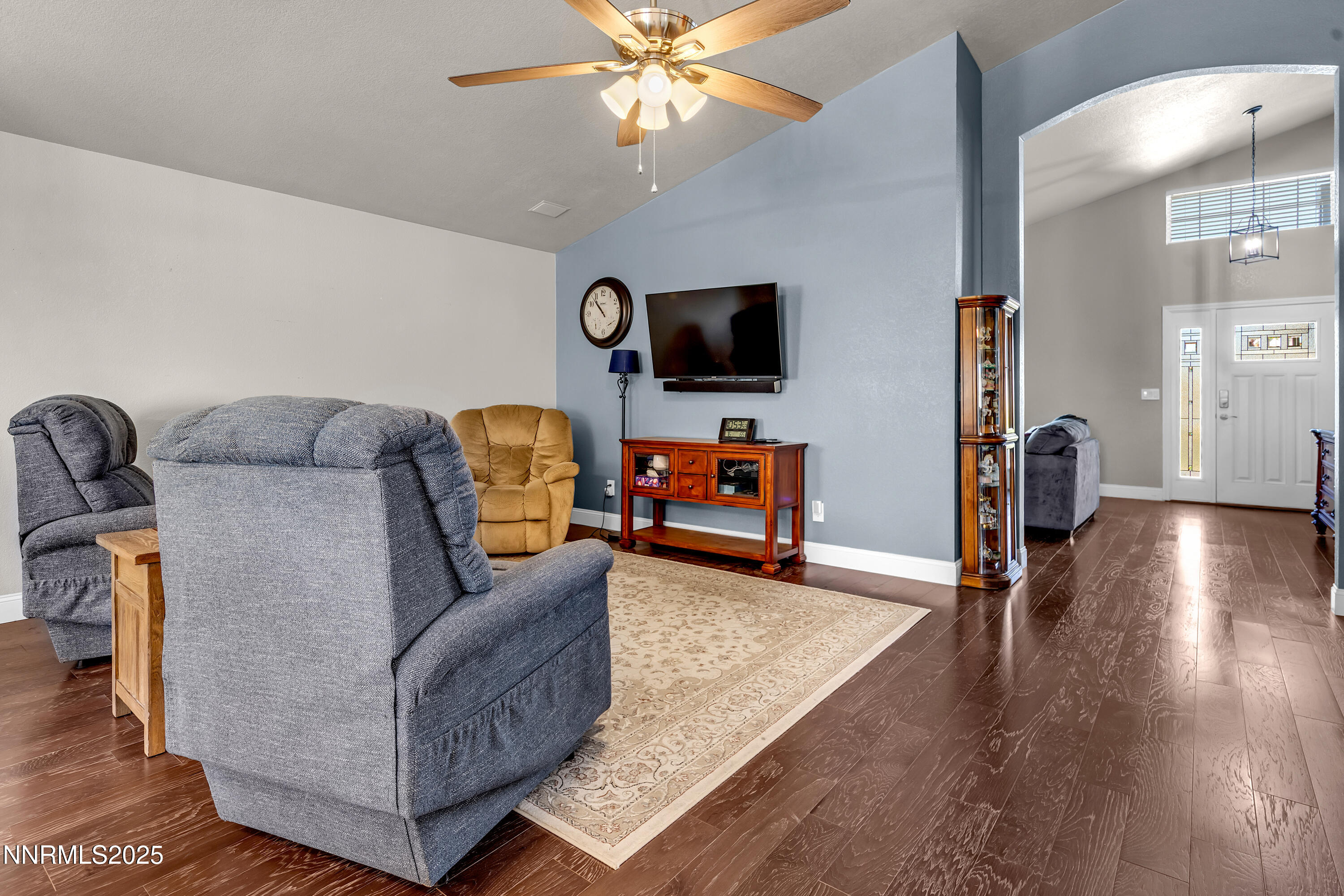 1077 Deena Way Fallon, NV 89406 - Photo 19 of 38 a living room with furniture and a flat screen tv