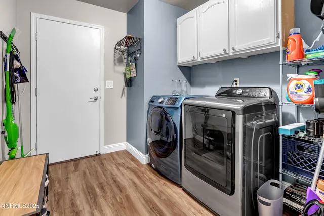 a view of a bathroom with a sink and a mirror