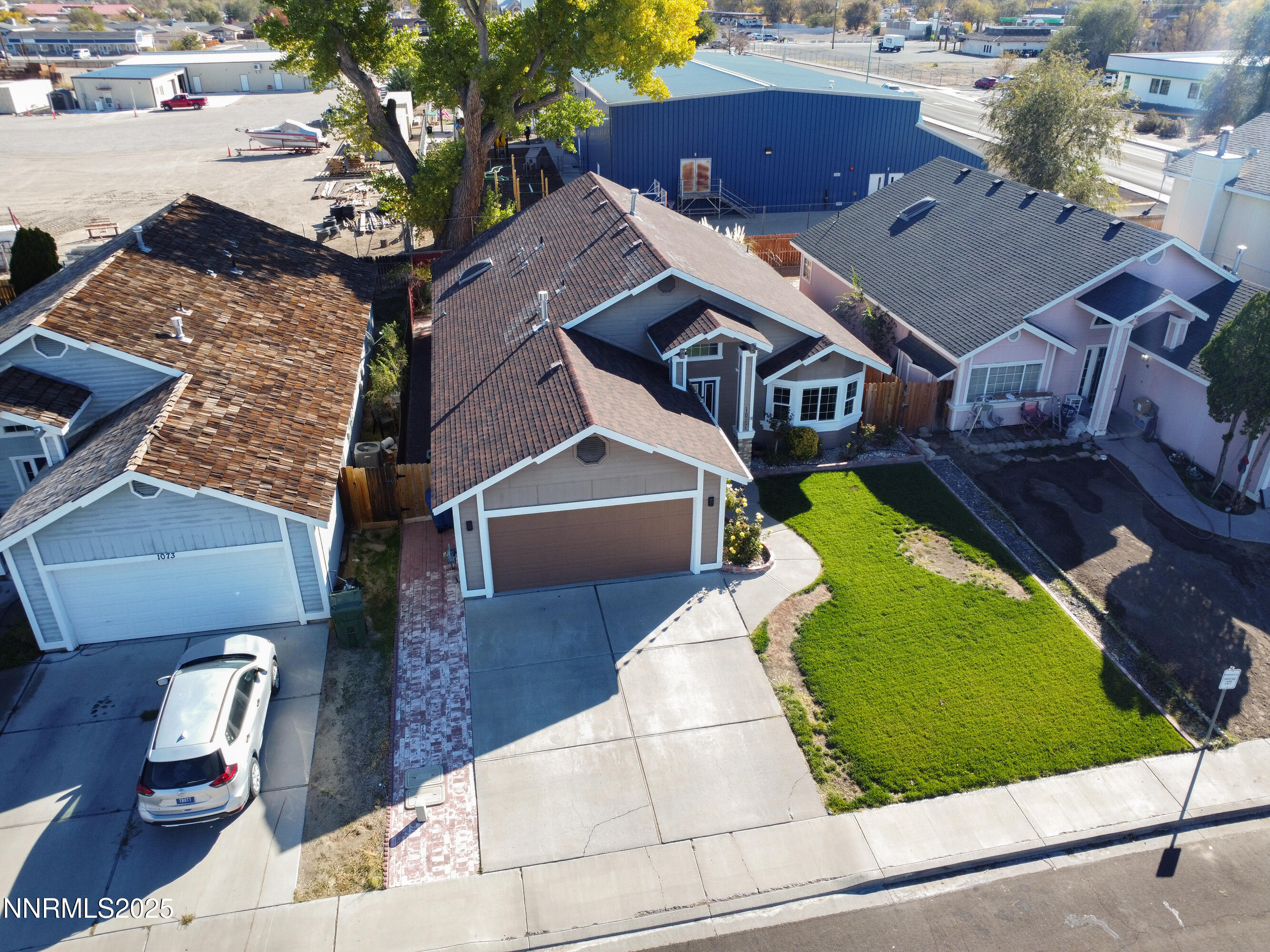 1077 Deena Way Fallon, NV 89406 - Photo 3 of 38 an aerial view of a house with a garden and yard