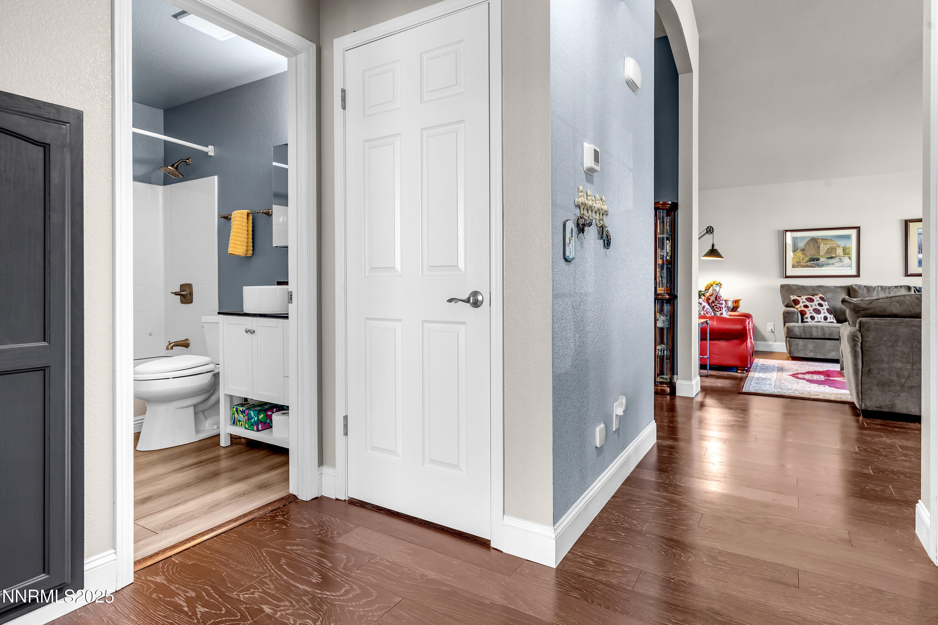 1077 Deena Way Fallon, NV 89406 - Photo 31 of 38 a view of a bathroom with a sink and a mirror