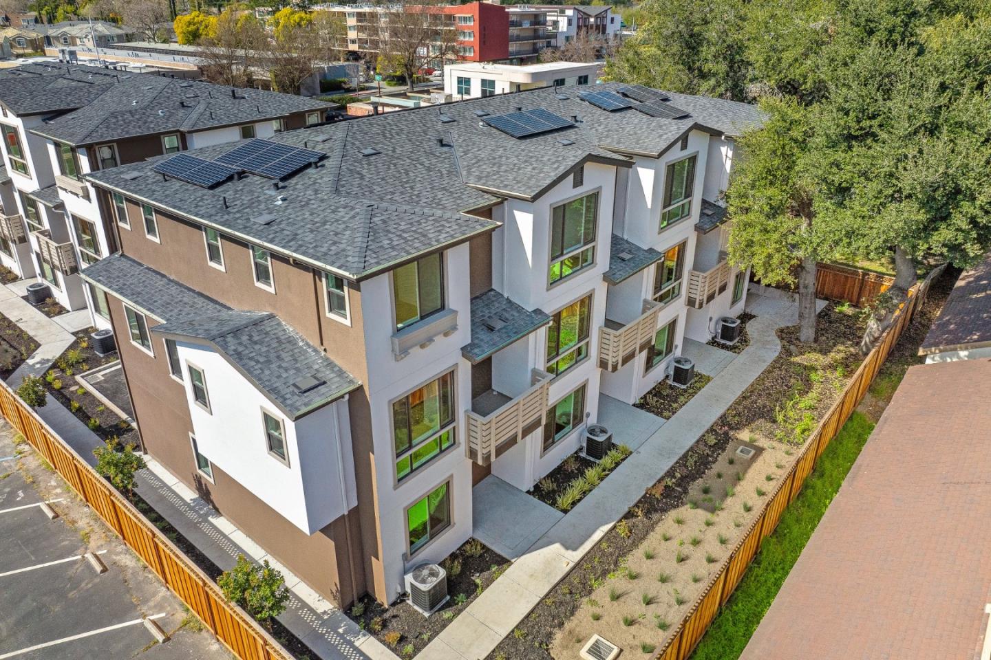 955 Woodside Road Redwood City, CA 94061 - Photo 44 of 46 a aerial view of a residential apartment building with a yard