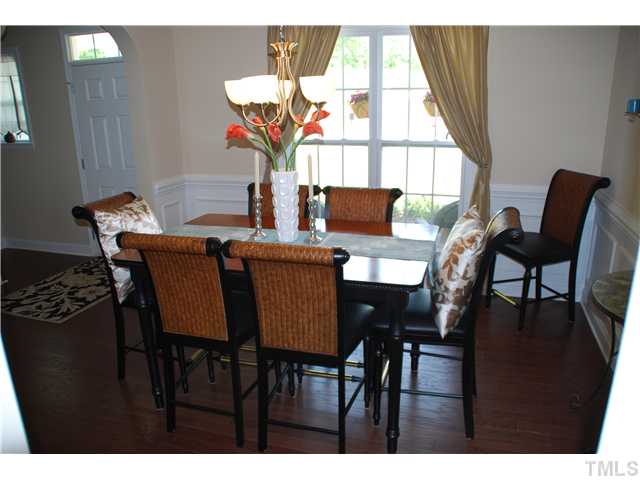 6736 Rex Road Holly Springs, NC 27540 - Photo 5 of 25 Another angle of dining room. This one from butler's pantry that is located between kitchen and dining room!