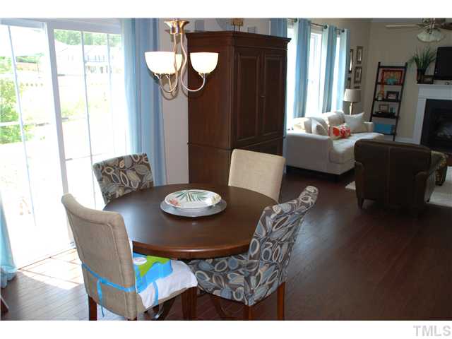 6736 Rex Road Holly Springs, NC 27540 - Photo 9 of 25 Sunny Breakfast room with direct access to private backyard and patio!