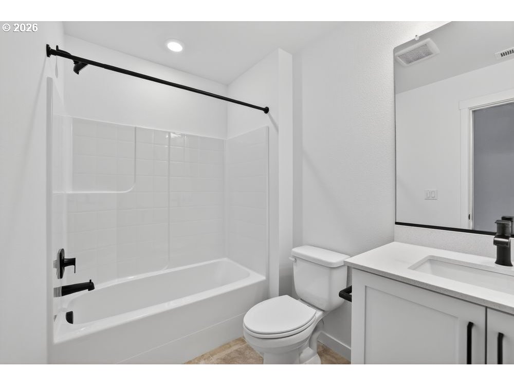 3704 Southwest 40th Street Gresham, OR 97080 - Photo 12 of 27 a bathroom with a sink toilet and shower