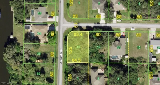 an aerial view of a residential building with outdoor space