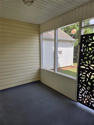 a view of a room and window