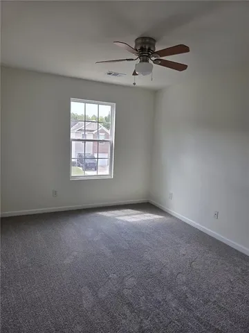wooden floor and window in a room