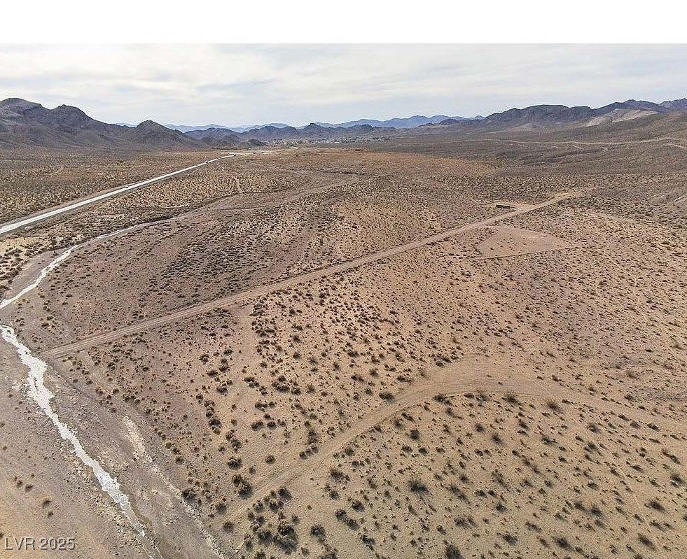 62301 East Us Highway Beatty, NV 89003 - Photo 3 of 9 View of rural area with a desert landscape and a mountainous background