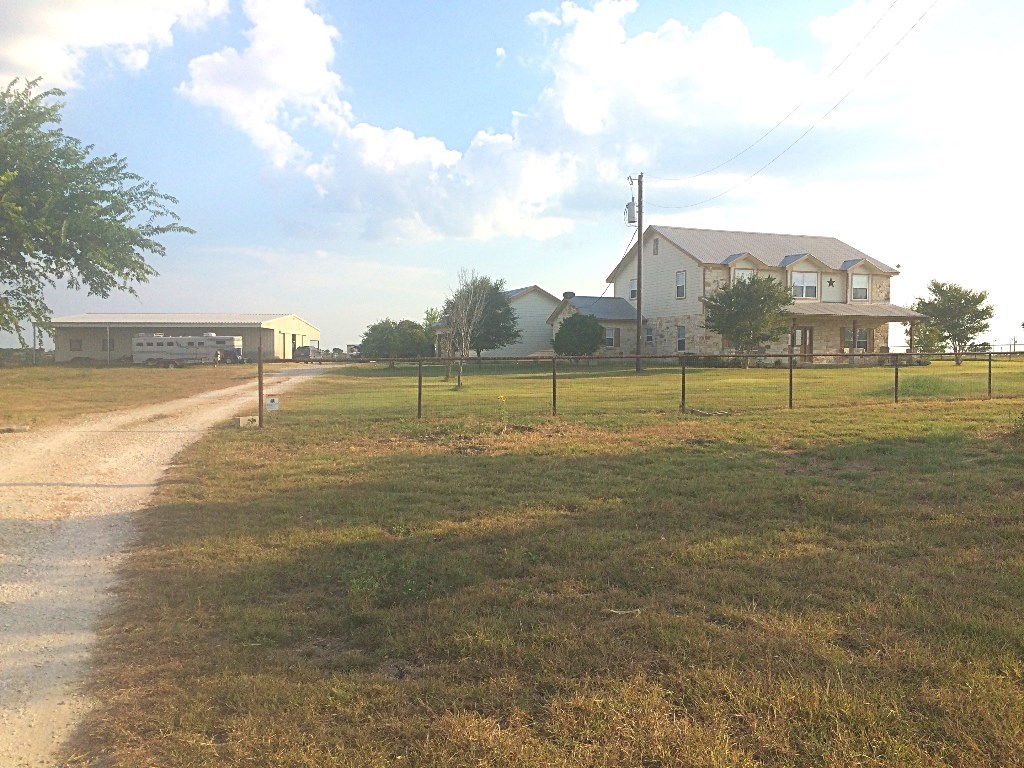 15801 Anderson Road Manor, TX 78653 - Photo 1 of 1 a view of an ocean and beach