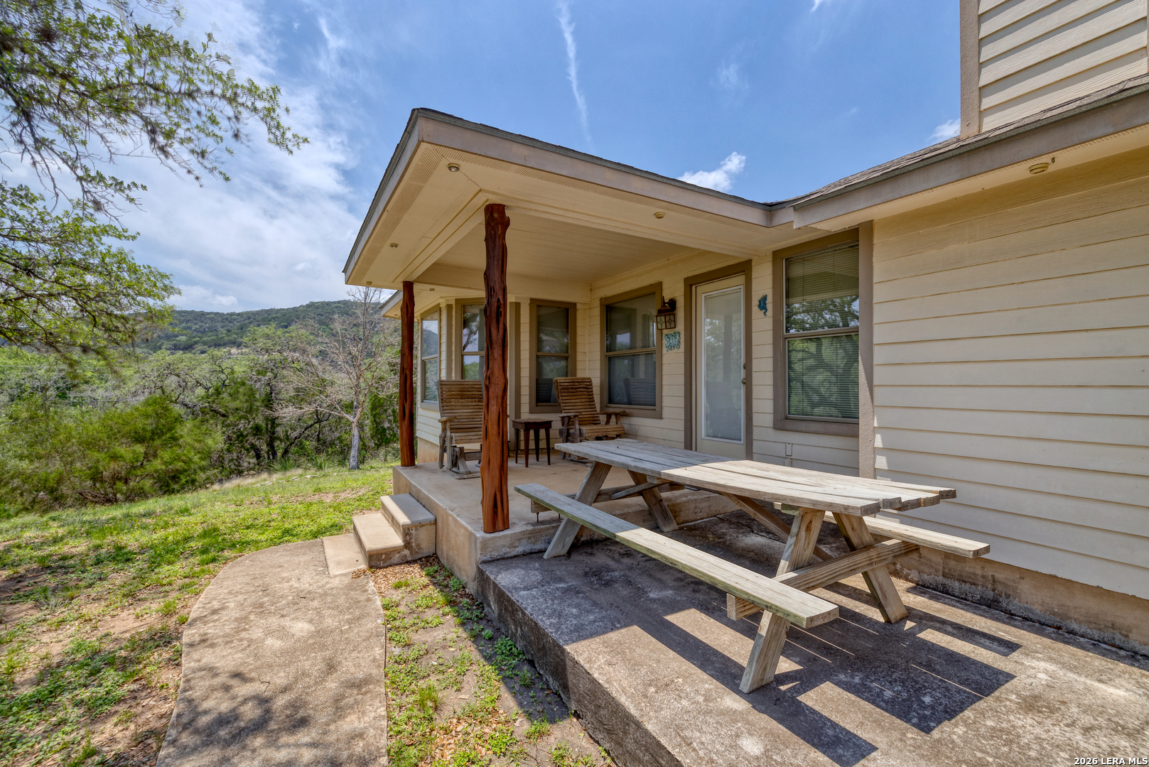 270 Robinson Road Concan, TX 78838 - Photo 14 of 50 a house view with a outdoor seating space