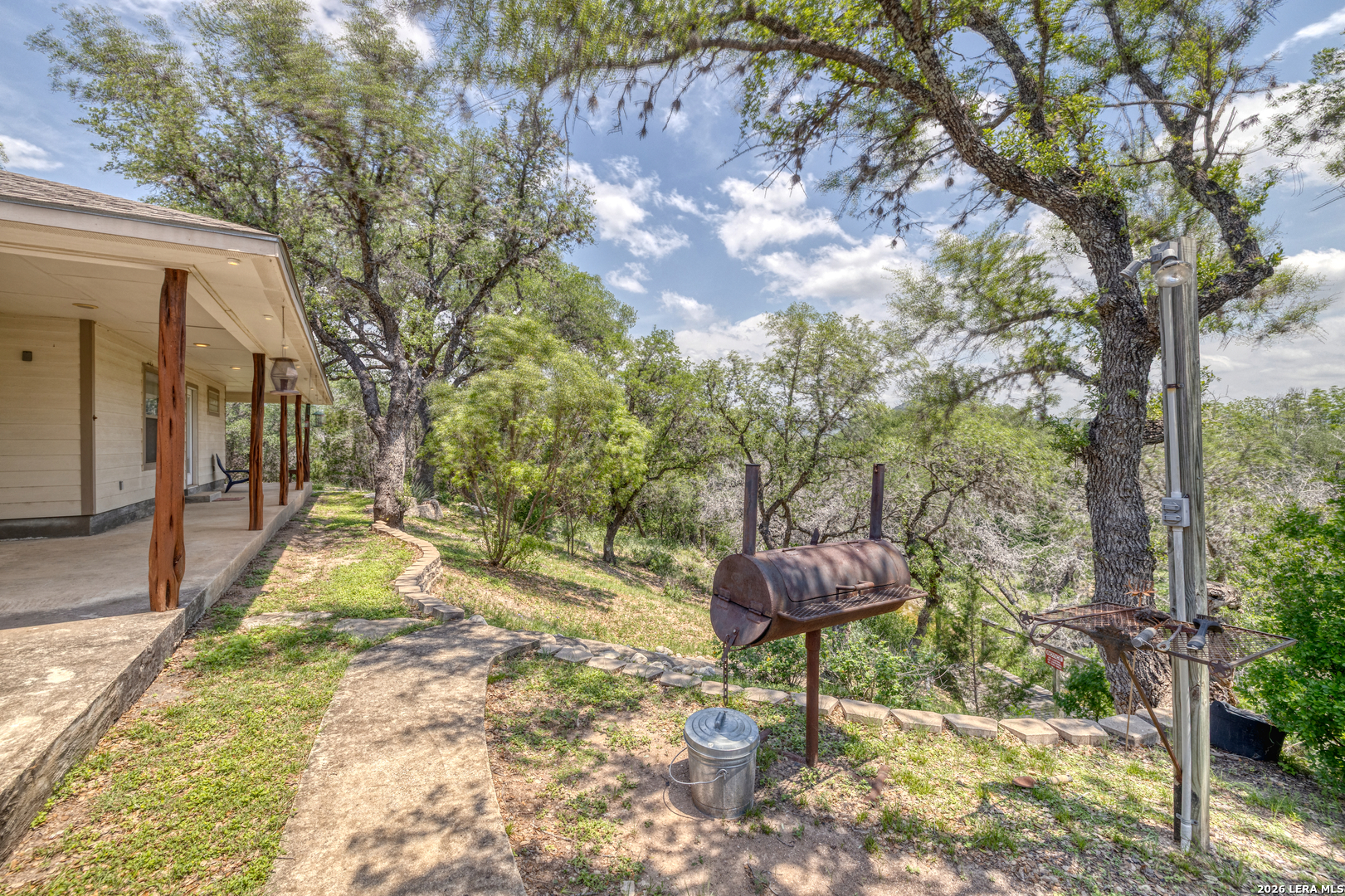 270 Robinson Road Concan, TX 78838 - Photo 15 of 50 a view of outdoor space and yard