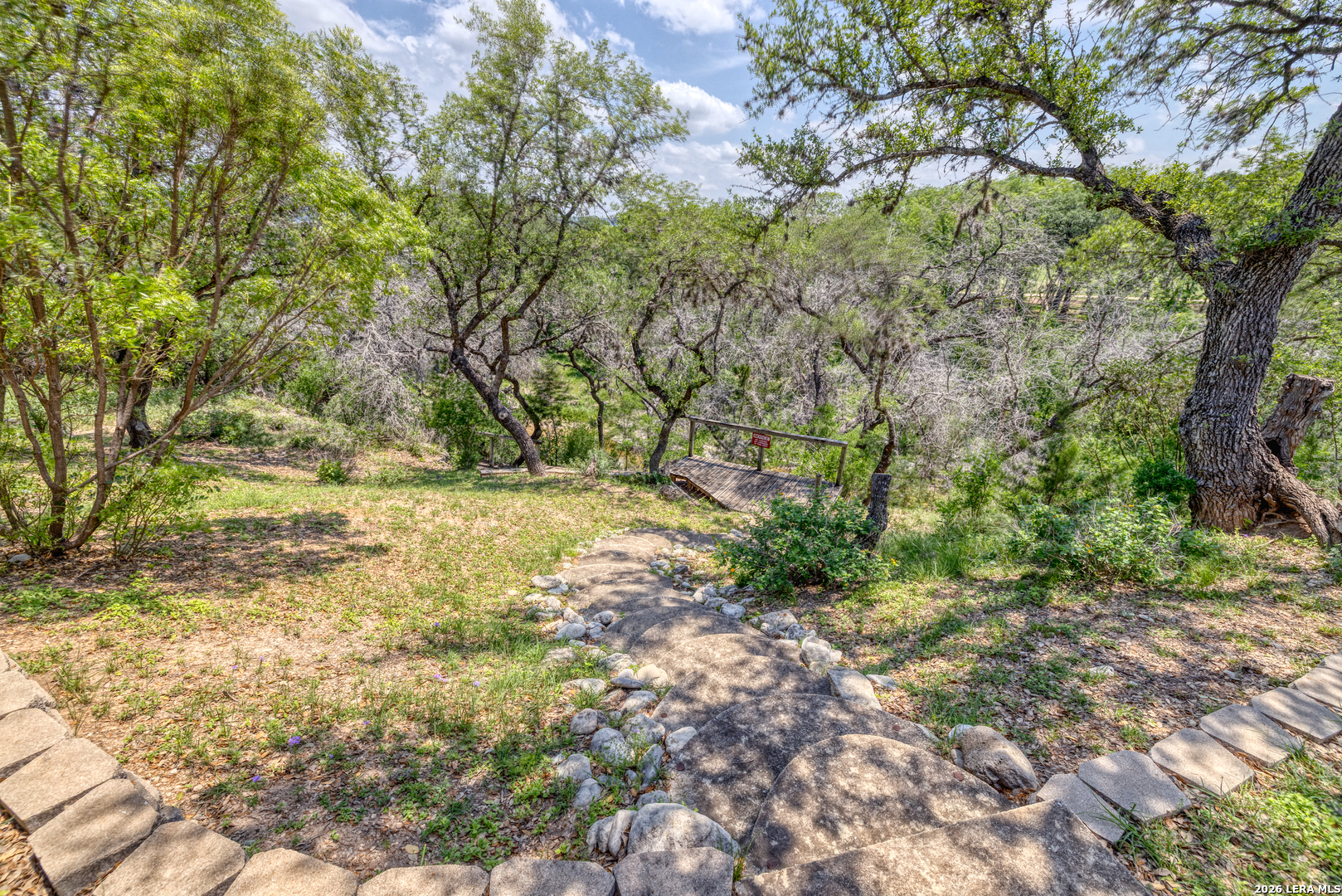 270 Robinson Road Concan, TX 78838 - Photo 16 of 50 a view of yard with green space