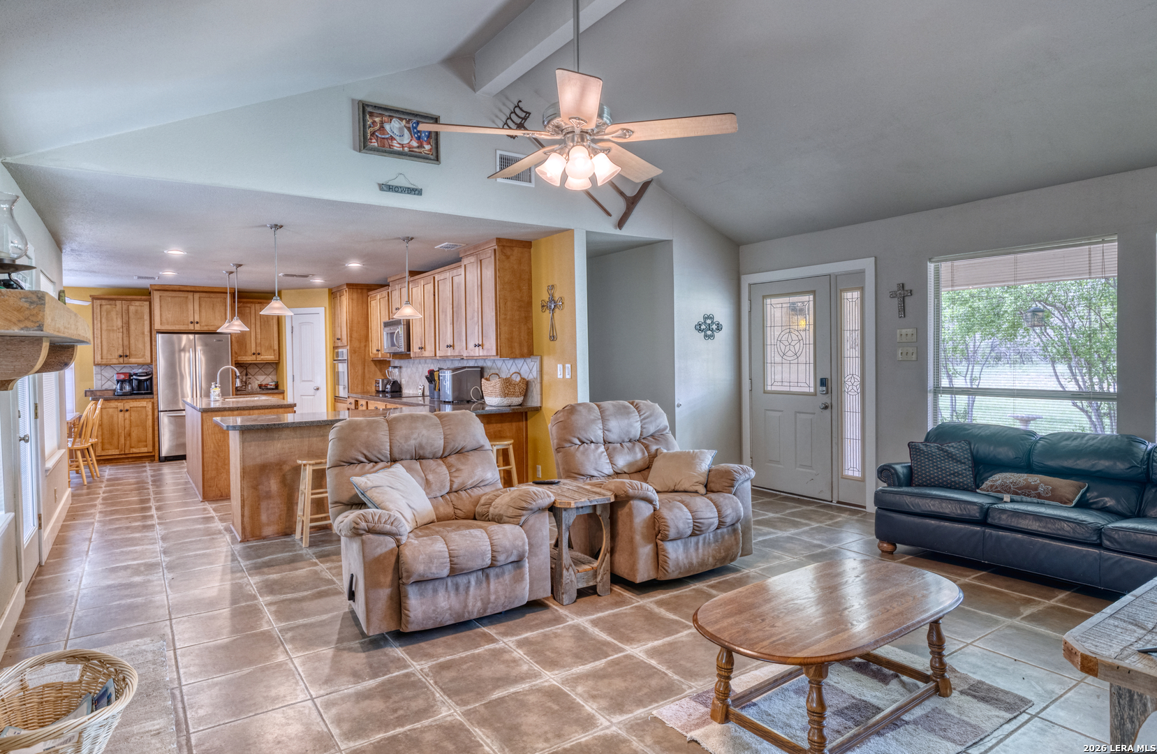 270 Robinson Road Concan, TX 78838 - Photo 31 of 50 a living room with furniture and a large window