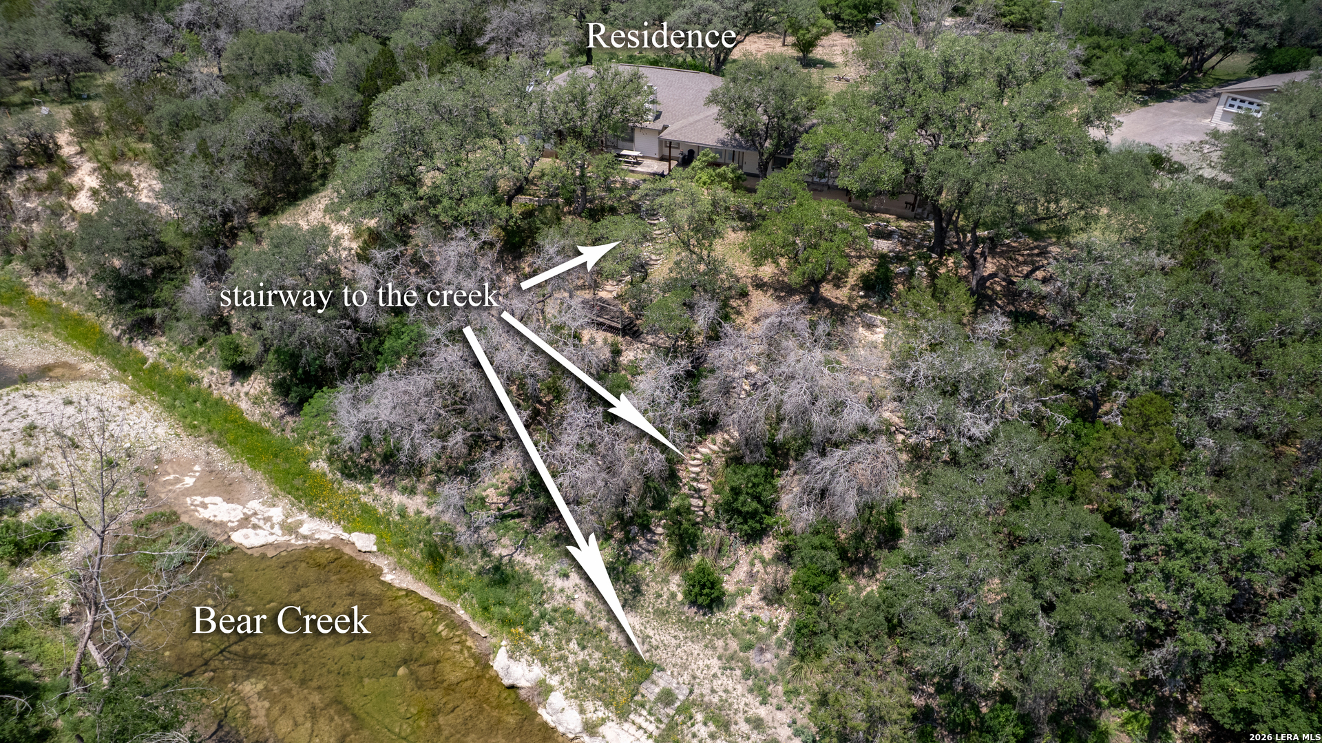 270 Robinson Road Concan, TX 78838 - Photo 46 of 50 a view of a forest with a tree