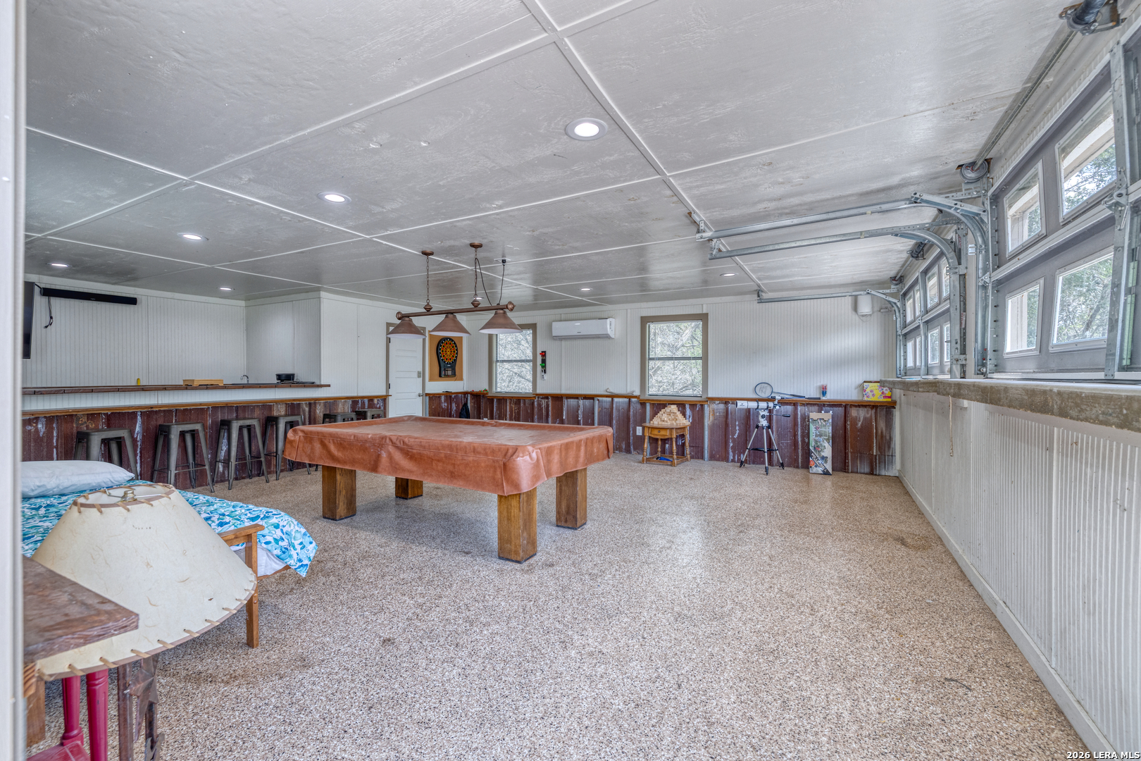 270 Robinson Road Concan, TX 78838 - Photo 7 of 50 a room with lots of furniture and a table