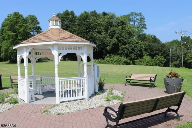 a view of a bench in the patio