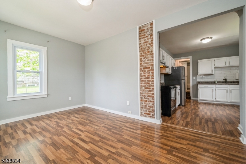 97 Allen Street, Unit 2 Netcong, NJ 07857 - Photo 7 of 29 a view of a kitchen with wooden floor and a kitchen