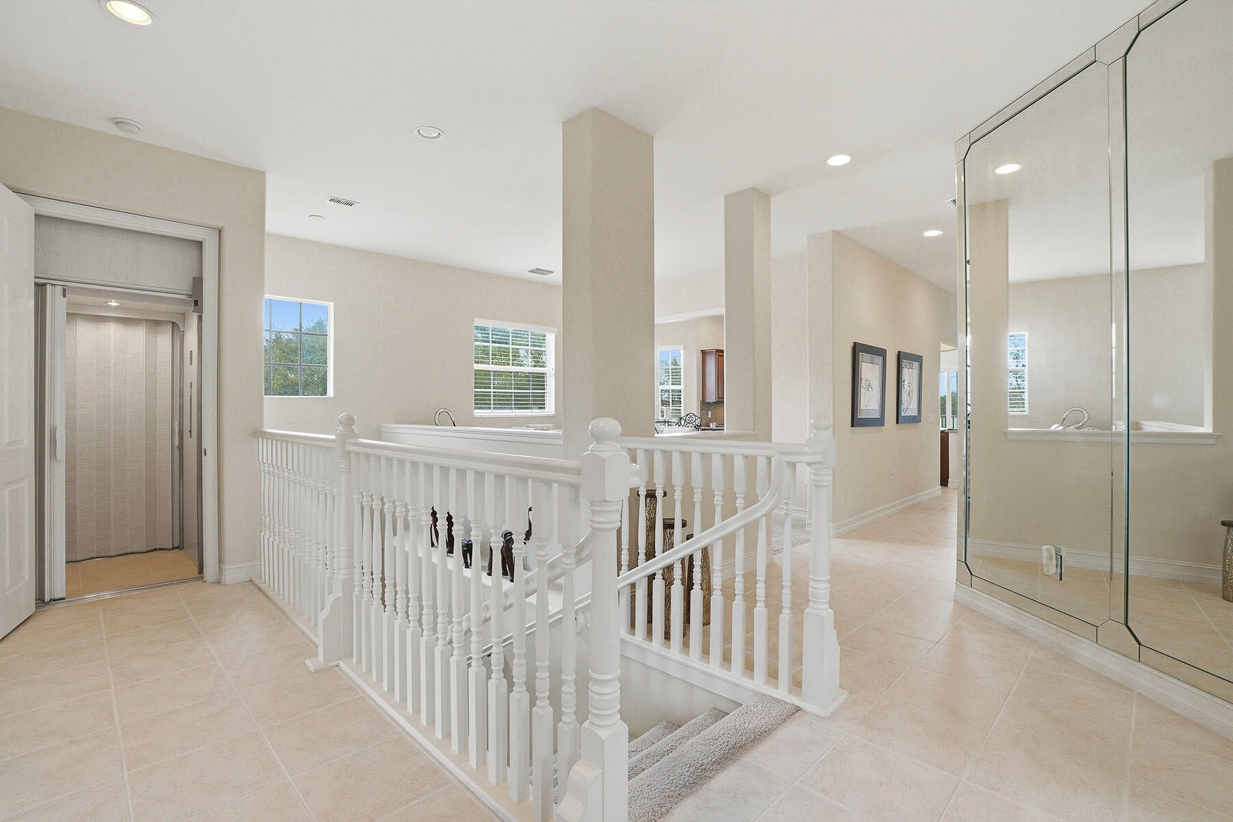 8605 Champions Point, Unit 103 Naples, FL 34113 - Photo 3 of 44 a view of hallway with windows