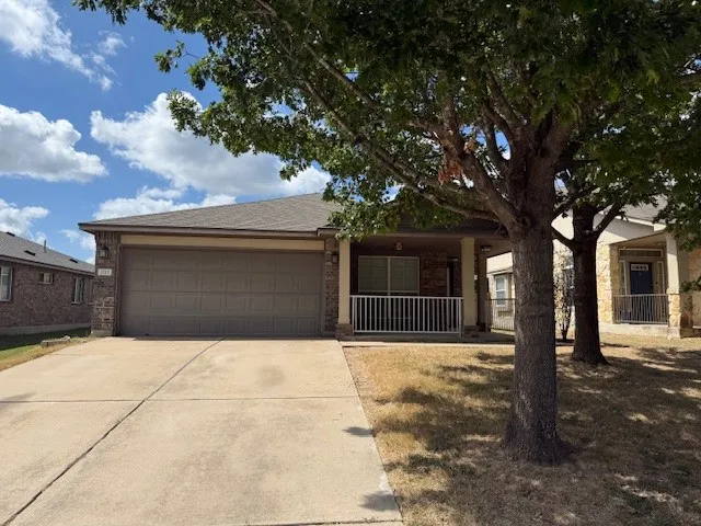 a house with trees in front of it