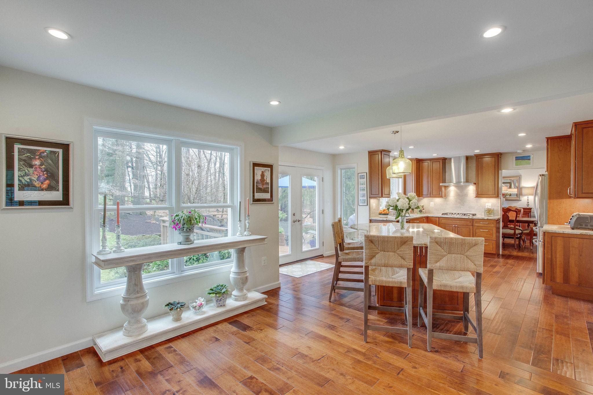 9027 Edgepark Road Vienna, VA 22182 - Photo 14 of 77 Huge windows allow light to stream into kitchen