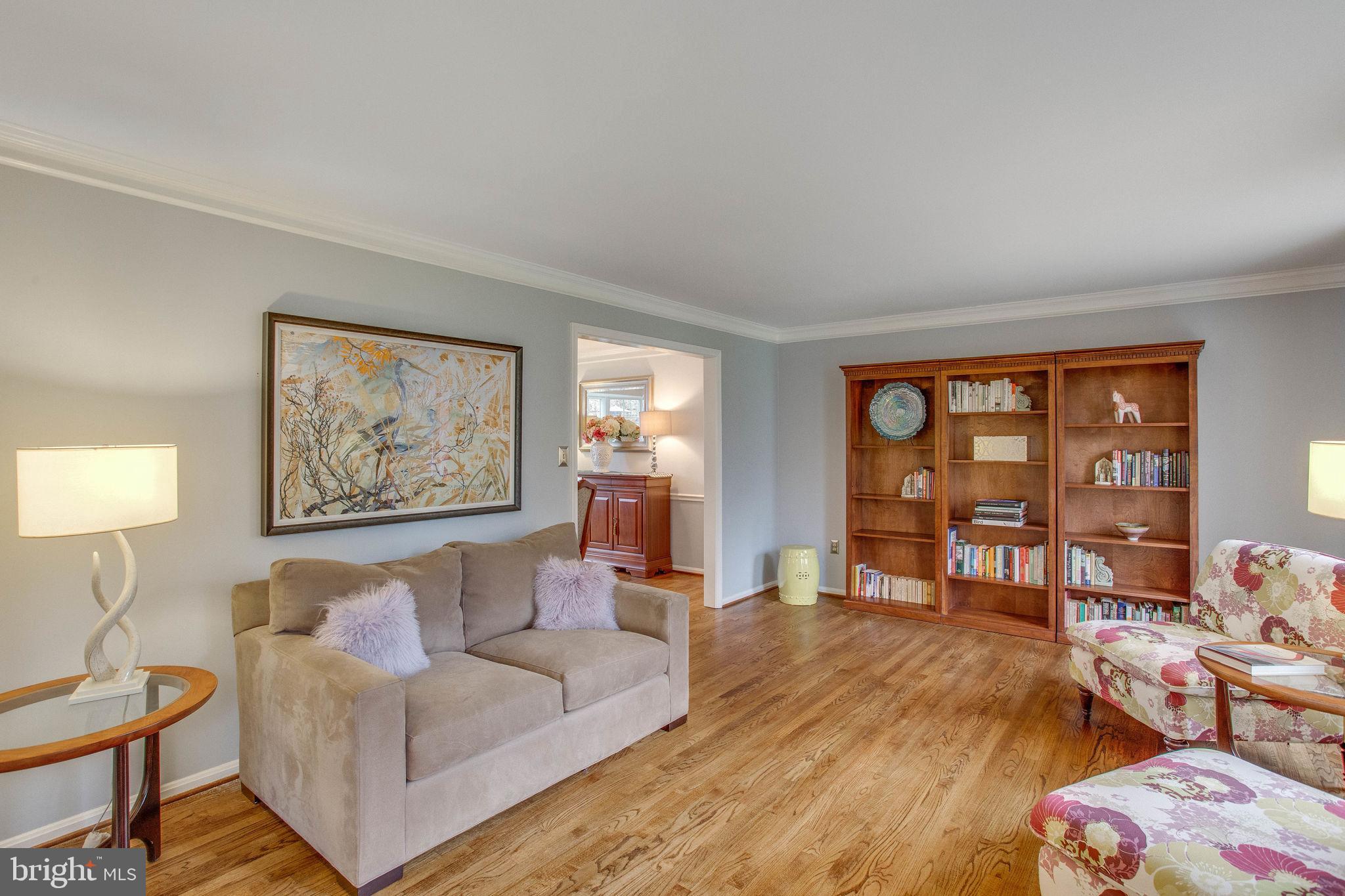9027 Edgepark Road Vienna, VA 22182 - Photo 22 of 77 Hardwood flooring continues in living room
