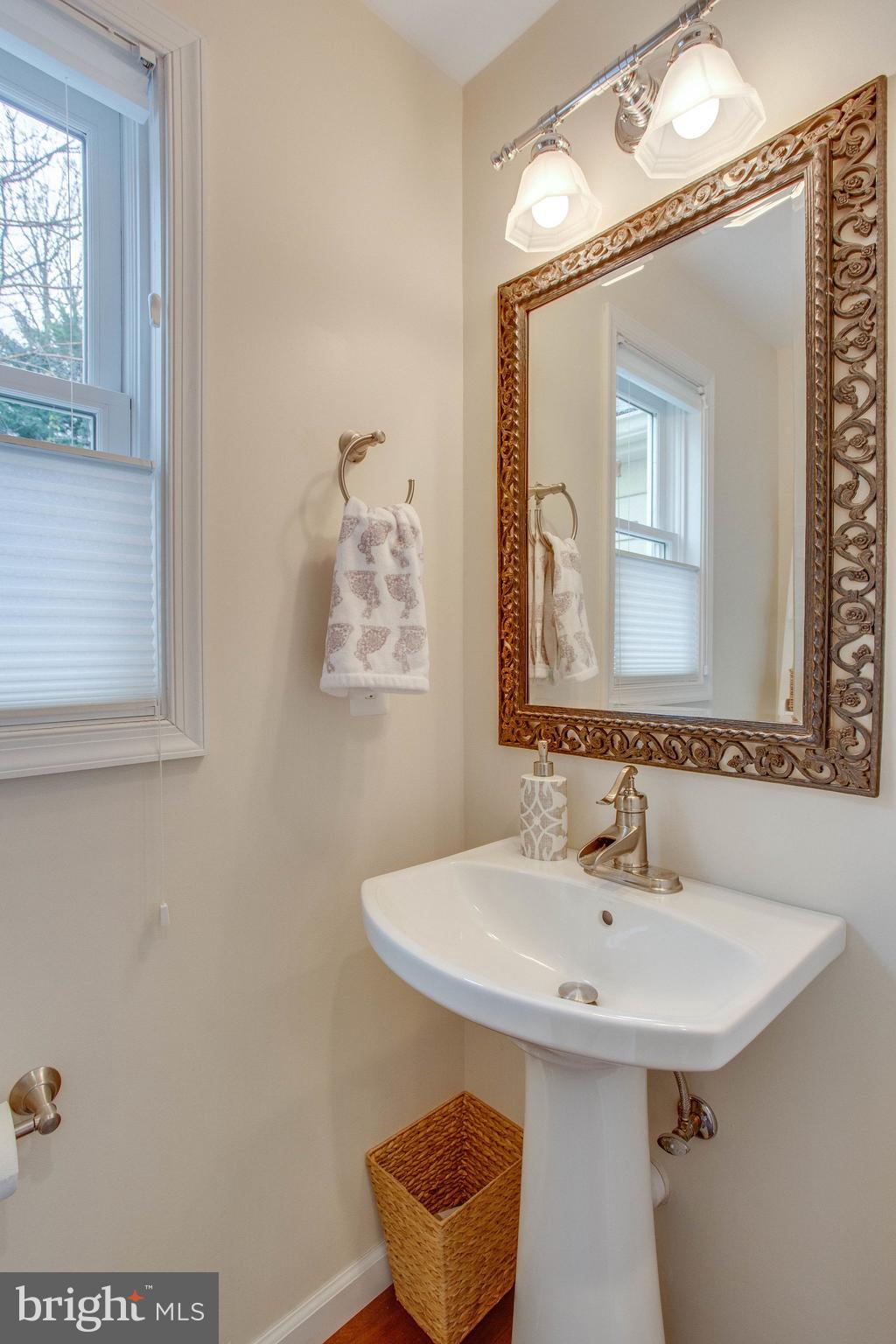 9027 Edgepark Road Vienna, VA 22182 - Photo 27 of 77 Powder room added/offering pedestal sink