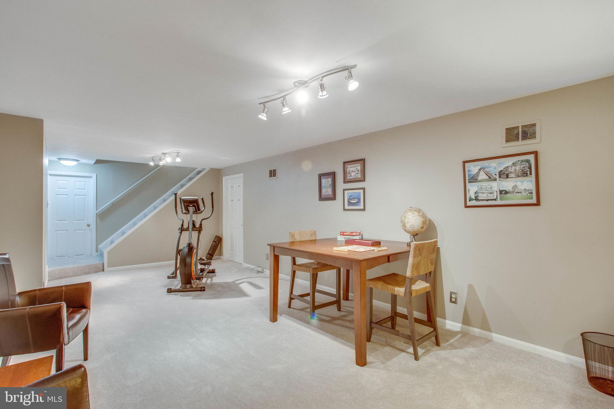 9027 Edgepark Road Vienna, VA 22182 - Photo 53 of 77 Room to games, workout, TV and more!